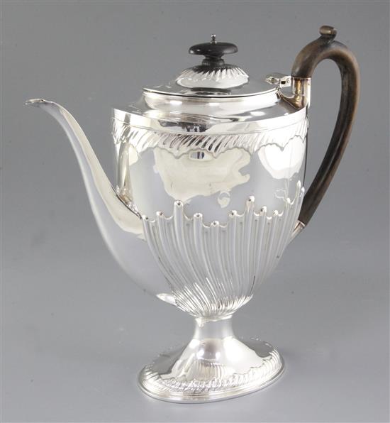 A Victorian demi fluted silver pedestal coffee pot,